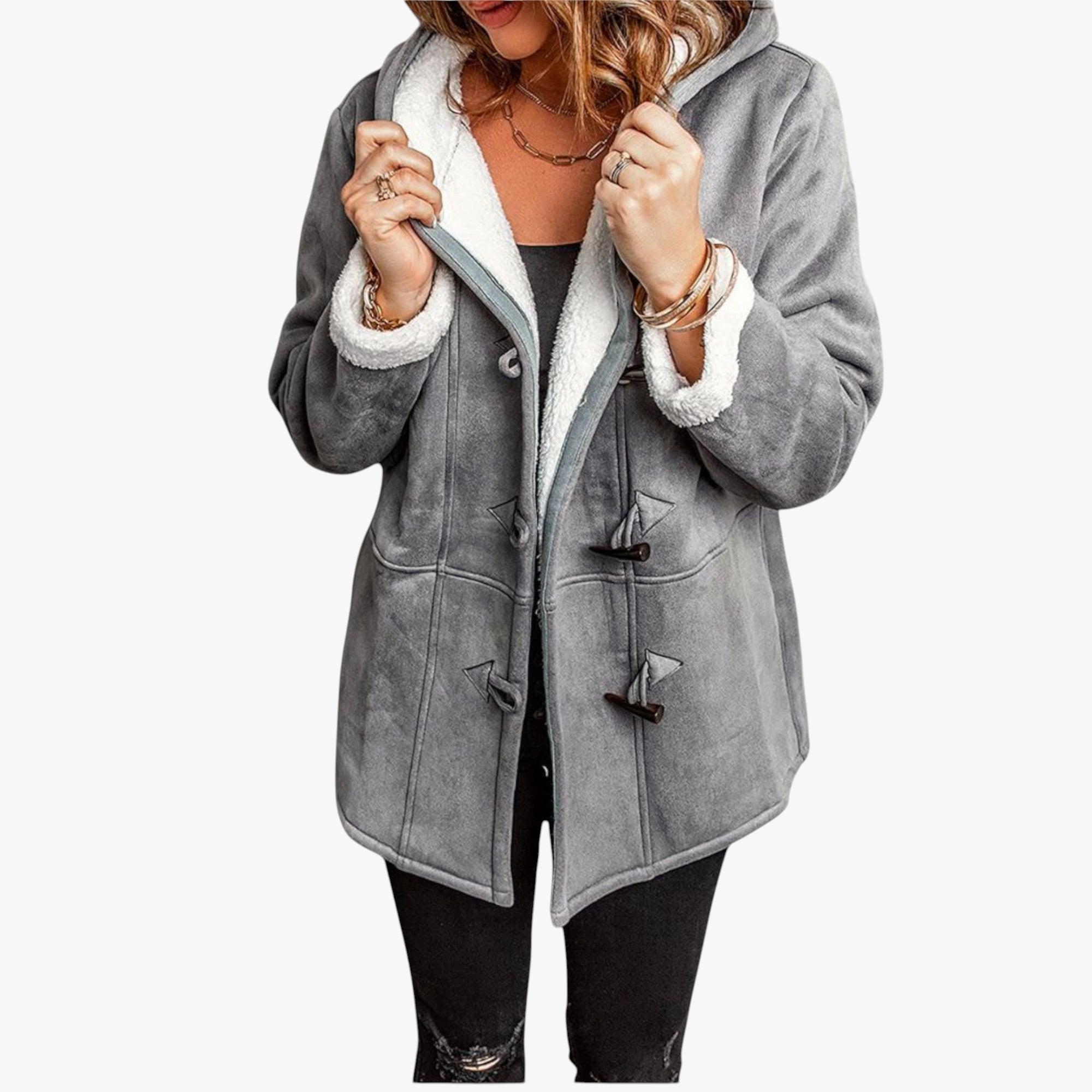 Gray coat with white fur lining worn by a person on a white background