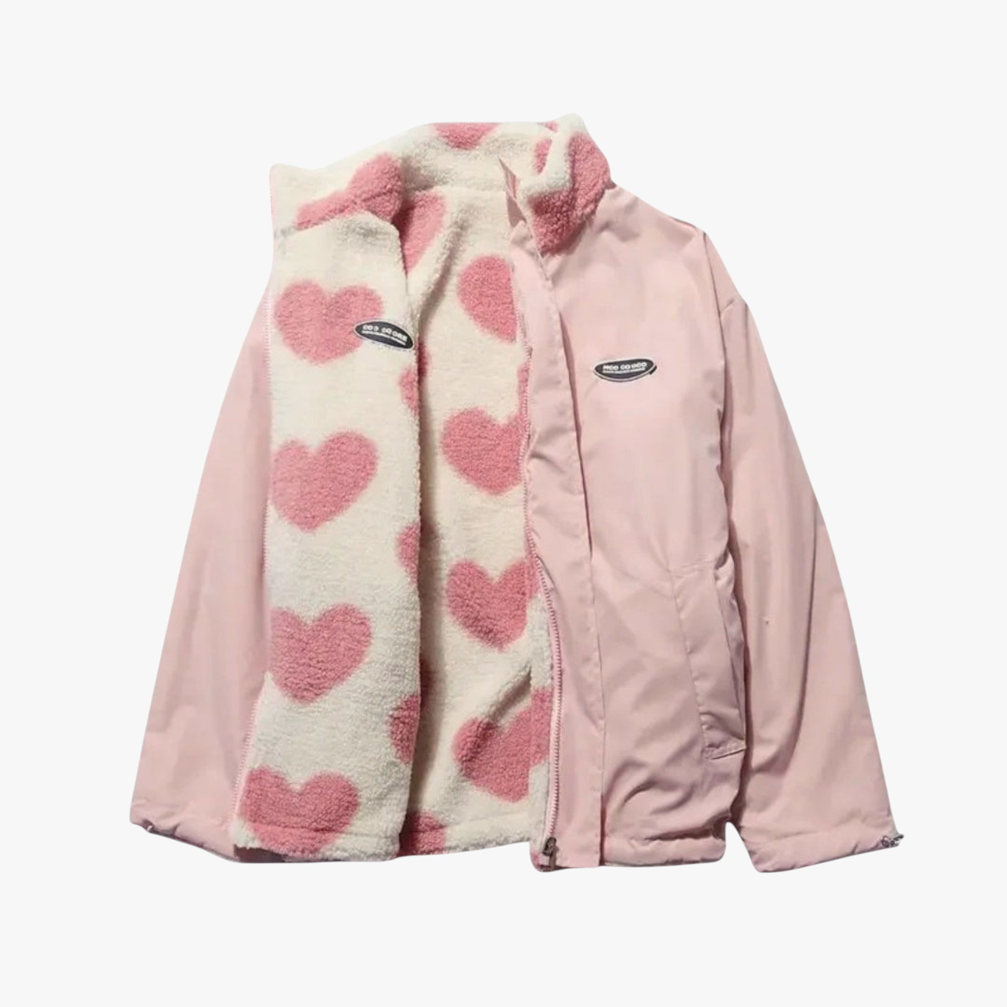 Pink jacket with heart patterned scarf on a white background
